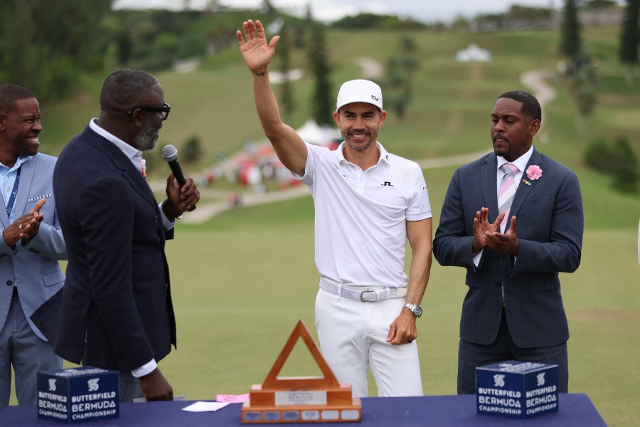 Camilo Villegas of Colombia celebrates with the trophy after winning the Butterfield Bermuda Championship at Port Royal Golf Course on November 12, 2023 in Southampton, Bermuda. -AFP PIC