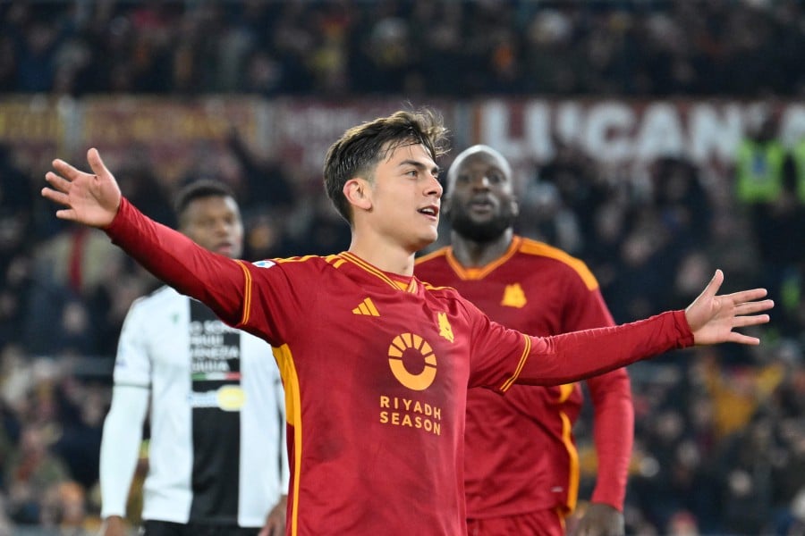 Roma's Paulo Dybala celebrates after scoring a goal during the Italian Serie A football match between AS Roma and Udinese on November 26, 2023 at the Olympic stadium in Rome. - AFP PIC