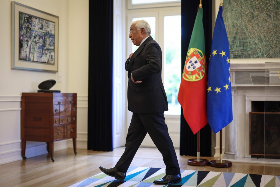 Portuguese Prime Minister Antonio Costa leaves after addressing the nation at Sao Bento Palace in Lisbon. - AFP PIC