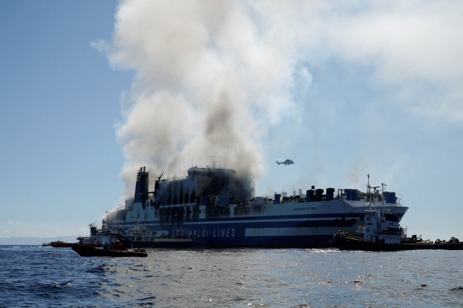 Smoke rises from the burning Italian-flagged Euroferry Olympia, after a fire broke out on the ferry, off the island of Corfu, Greece. - REUTERS PIC