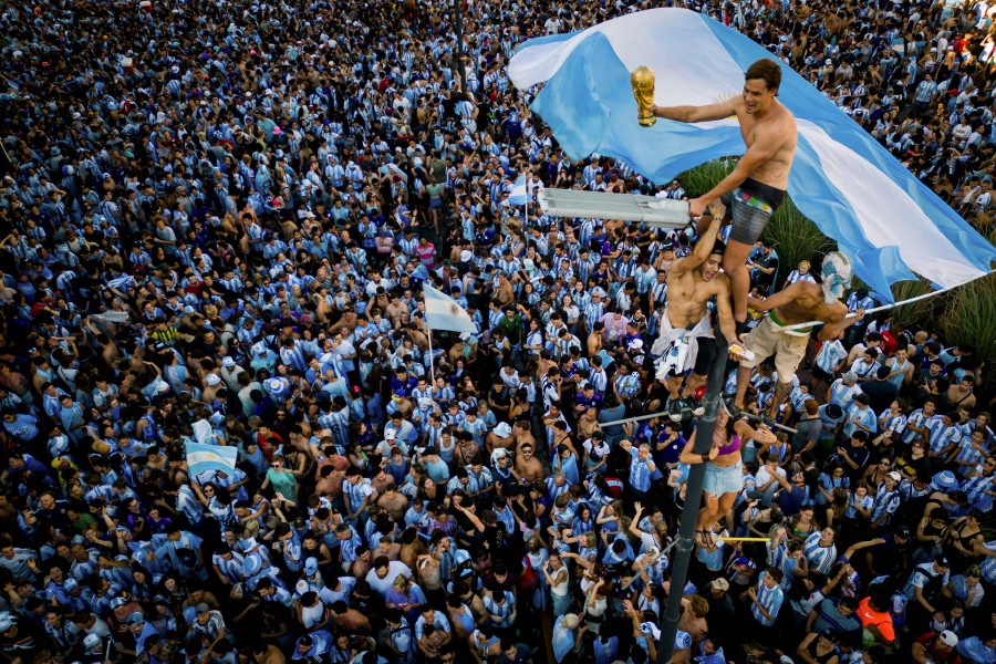  In this aerial view fans of Argentina celebrate winning the Qatar 2022 World Cup against France at the Obelisk in Buenos Aires. - AFP PIC