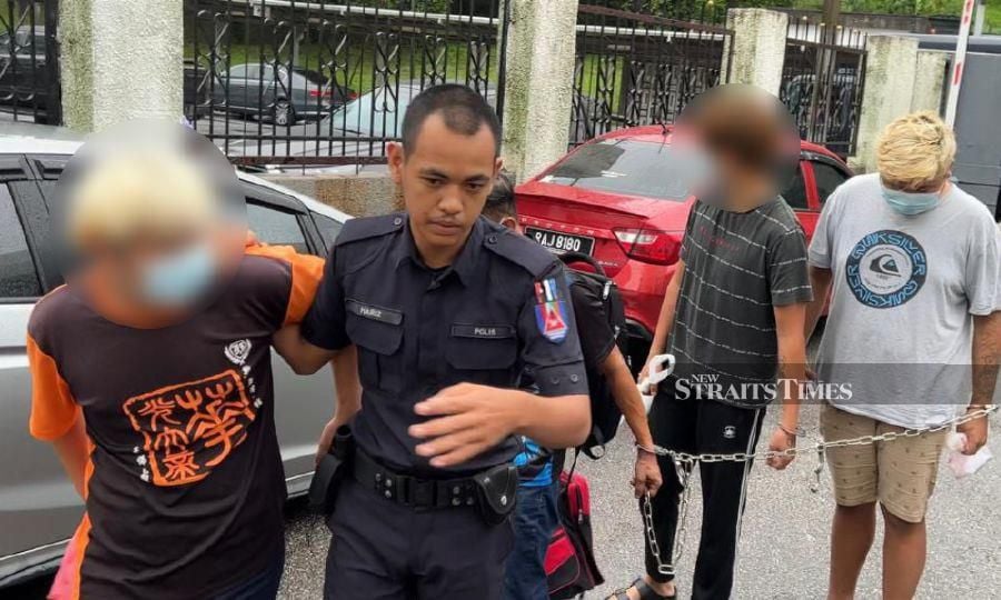 The accused are seen arriving at the Johor Baru magistrate’s court ahead of the hearing. - NSTP/OMAR AHMAD