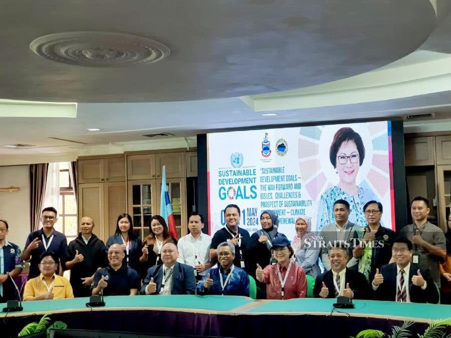  Sabah Tourism, Culture and Environment Minister Datuk Christina Liew (seated, 3rd right) with Sabah Parks director Dr Maklarin Lakim (seated, centre) with participants attending the sustainable training course. -Photo courtesy of Sabah Tourism Ministry.