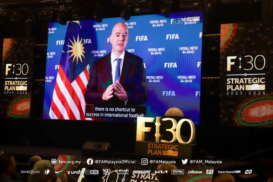 A large screen shows Fifa president Gianni Infantino speaking during the second phase of F:30 Roadmap launch in Subang. - Pic credit Facebook FAMalaysiaOfficial/ `