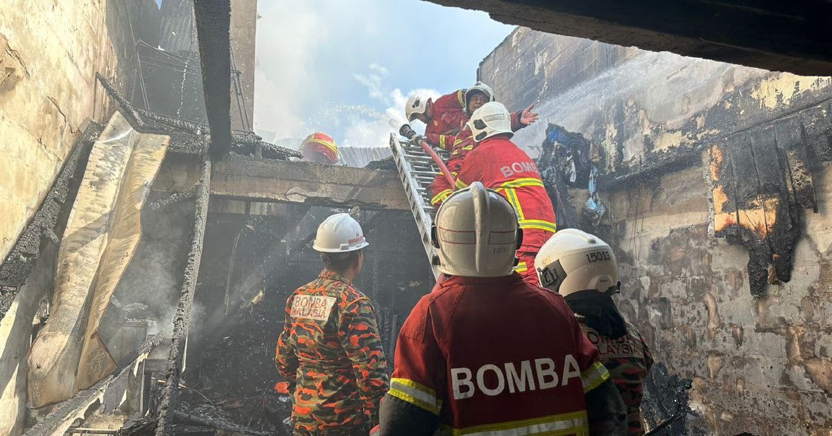 Charred body of 6-year-old boy in one of five houses razed in Kuching ...