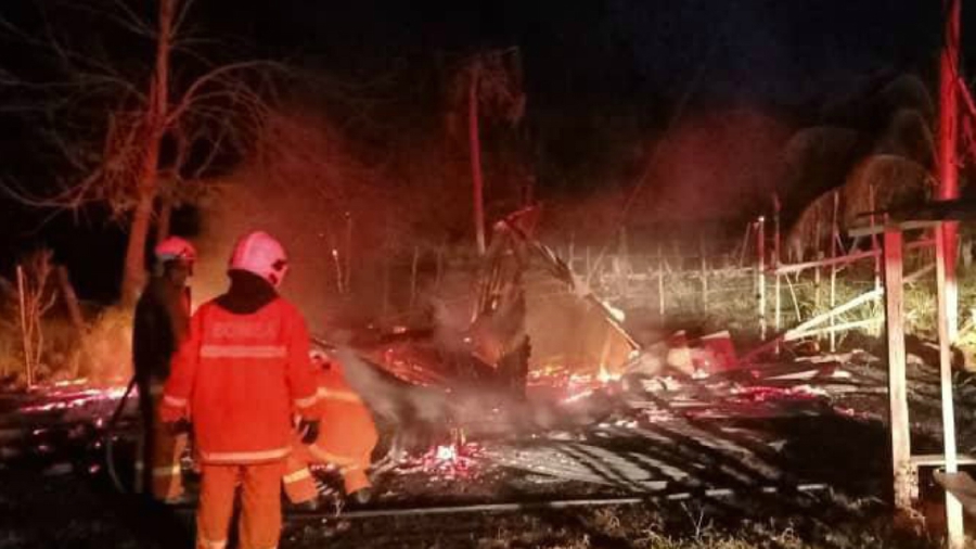 A sundry shop in Kampung Sarang, about 40km from Kota Belud town was razed to the ground last night. — Photo courtesy of Fire and Rescue Department