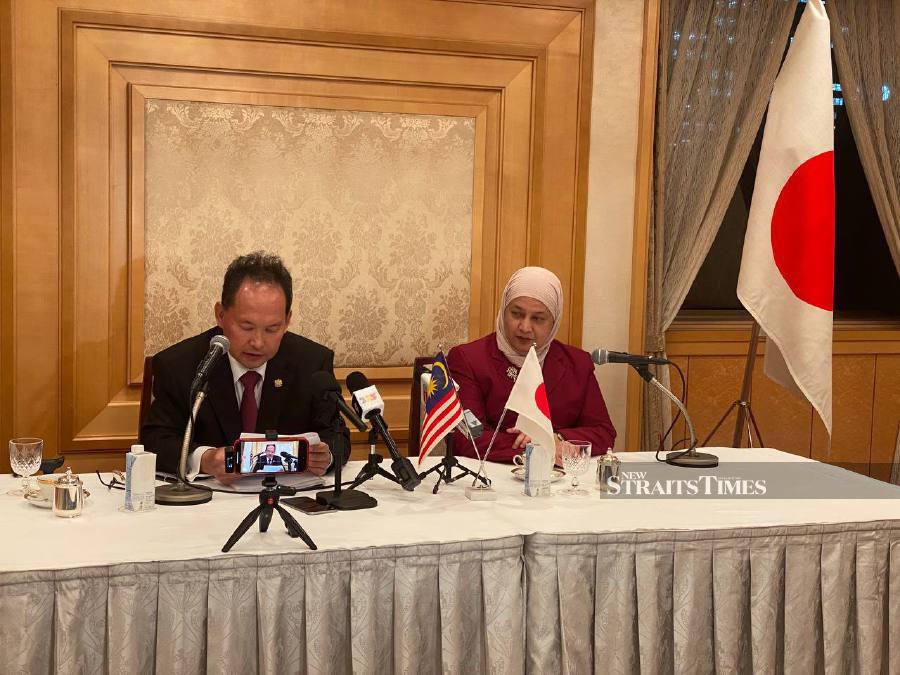 Malaysian ambassador to Japan, Datuk Shahril Effendi Abd Ghany (left) and Asean-Malaysia National Secretariat Director - General Datuk Zanariah Zainal Abidin (right) speaking to Malaysian press during a press conference in Tokyo. - NSTP/ HAZWEEN HASSAN