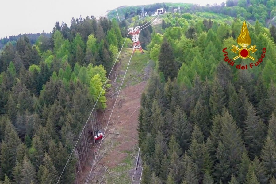 A photo grabbed from an aerial video taken on May 23,  and handout on May 24,  by The Italian Firefighters "Vigili del Fuoco" shows a cable car that crashed to the ground a few hundred meters below its arrival point at Mottarone peak above the resort town of Stresa on the shores of Lake Maggiore in the Piedmont region. - AFP pic/Vigili Del Fuoco