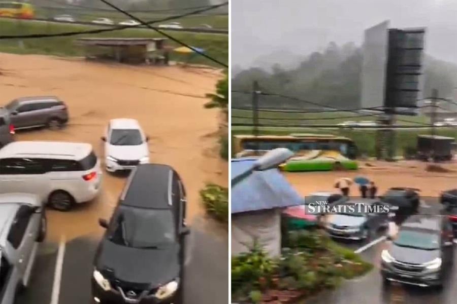 A water column and mud flood hit Bukit Tinggi and Janda Baik this evening following continuous rain. - NSTP/ AMIR HAMZAH NORDIN