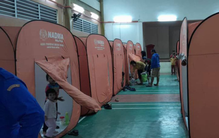 A total of 30 flood victims were accommodated at PPS Dewan Mellenia in Debak, Betong. - Pic courtesy JPBN Sarawak