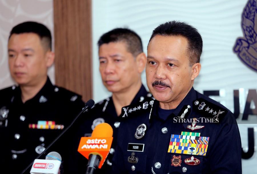 Perak police chief Datuk Seri Mohd Yusri Hassan Basri speaking to reporters during a press conference at the state police headquarters. -NSTP/L.MANIMARAN