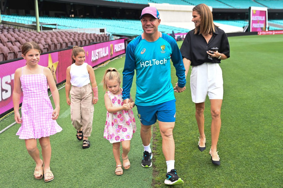 Australia's David Warner, his wife Candice and their children leave after a press conference ahead of the third Test match between Australia and Pakistan at the Sydney Cricket Ground in Sydney. - AFP PIC