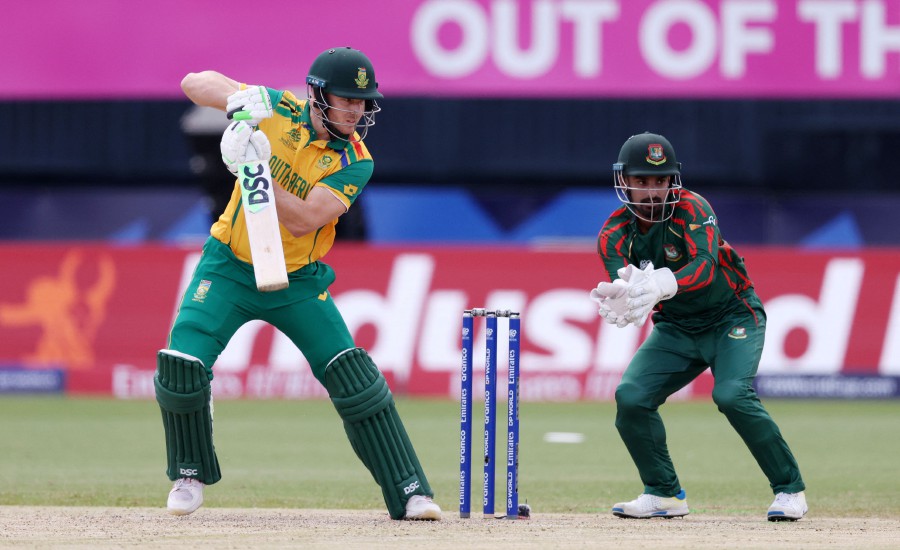 David Miller of South Africa plays a shot as Litton Das of Bangladesh keeps during the ICC Men's T20 Cricket World Cup West Indies & USA 2024 match between South Africa and Bangladesh at Nassau County International Cricket Stadium on June 10, 2024 in New York, New York. -- Pic: GETTY IMAGES NORTH AMERICA /AFP