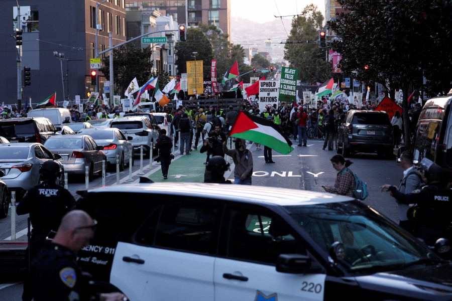 Protesters block the way to the Moscone Center during the APEC (Asia-Pacific Economic Cooperation) Summit, in San Francisco, California. - REUTERS PIC