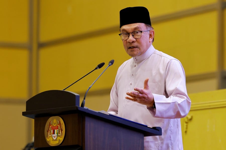 Prime Minister Datuk Seri Anwar Ibrahim delivers his speech during the thanksgiving ceremony in conjunction with One Year Administration of MADANI Government in Putrajaya. - BERNAMA PIC