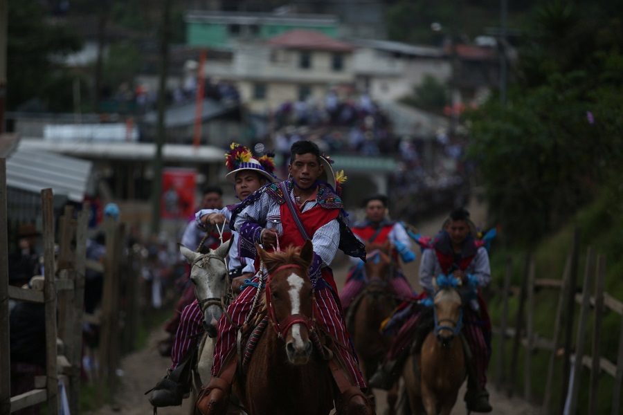 Riders participate in the annual horse race for drunk riders commemorating the Day of the Dead on All Saints Day at the village of Todos Los Santos Cuchumatan, Guatemala on Nov 1. Image by REUTERS