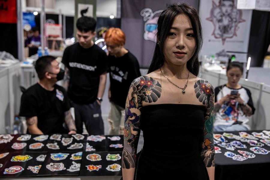 Malaysian-born tattoo artist who inked Beckham, LeBron, carves his name at  Hong Kong fair