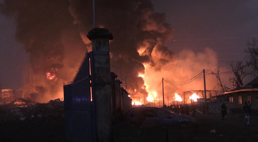 This image grab taken from AFPTV video footage on December 18, 2023 shows flames from the fire at Conakry's main fuel depot. - AFP PIC