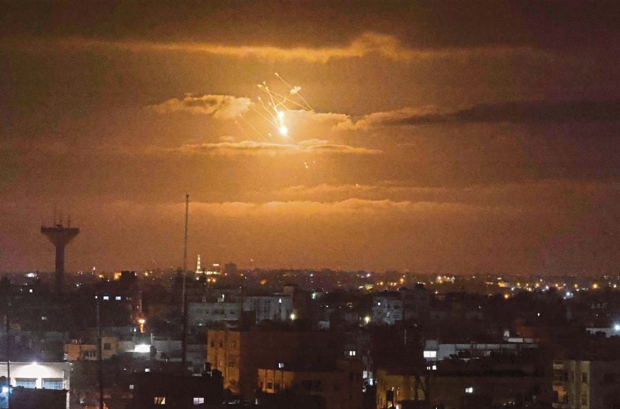 Israel said it will close its only crossing from the Gaza Strip for workers on Sunday in response to overnight rocket fire, stopping short of conducting retaliatory strikes in an apparent bid to ease tensions. -AFP file pic