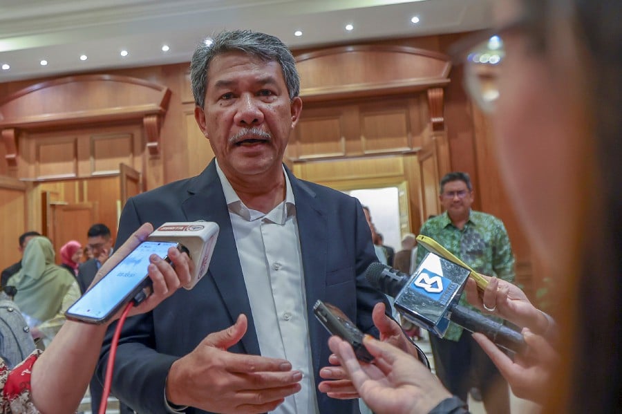Foreign Minister Datuk Seri Mohamad Hasan speaking to reporters after a special two-hour meeting to launch the Asean-Malaysia 2025 chairmanship at the Perdana Putra. - BERNAMA PIC