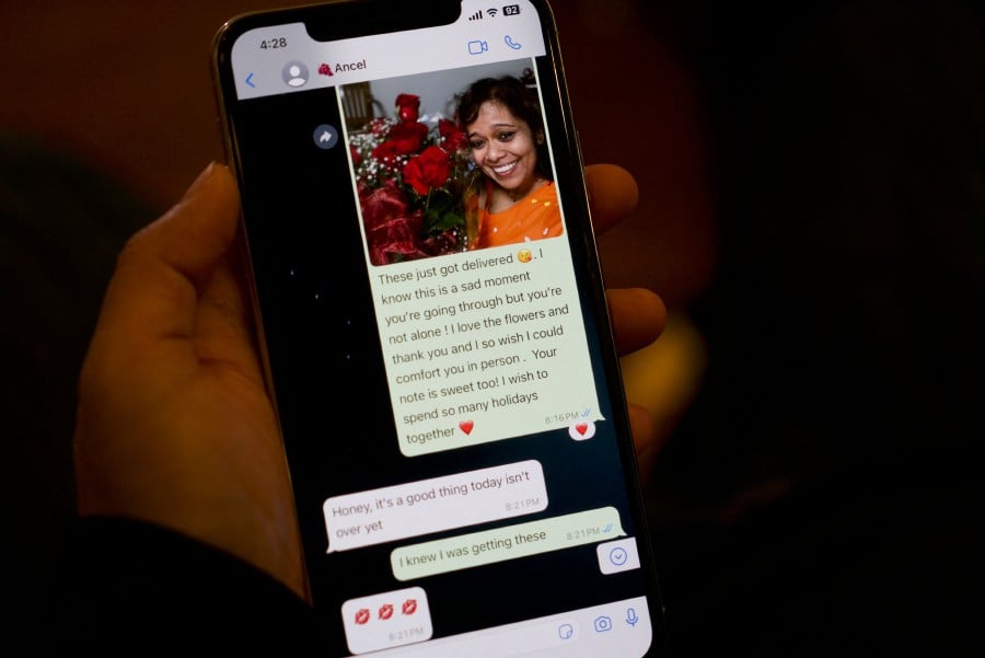 A message and photo that Shreya Datta, a tech professional who was a victim of an online scam known as "pig butchering," shared with a person who would later turn out to be a scammer is displayed on her phone in Philadelphia, Pennsylvania. - AFP PIC