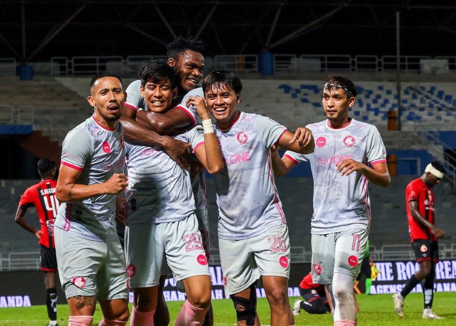Police players celebrate a goal against Kelantan at the MBPJ Stadium. - BERNAMA PIC