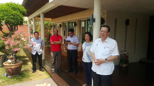 Penang Chief Minister Lim Guan Eng and wife Betty Chew entertain reporters, who were given a tour of his RM2.8 million bungalow house. Pix by Predeep Nambiar. 
