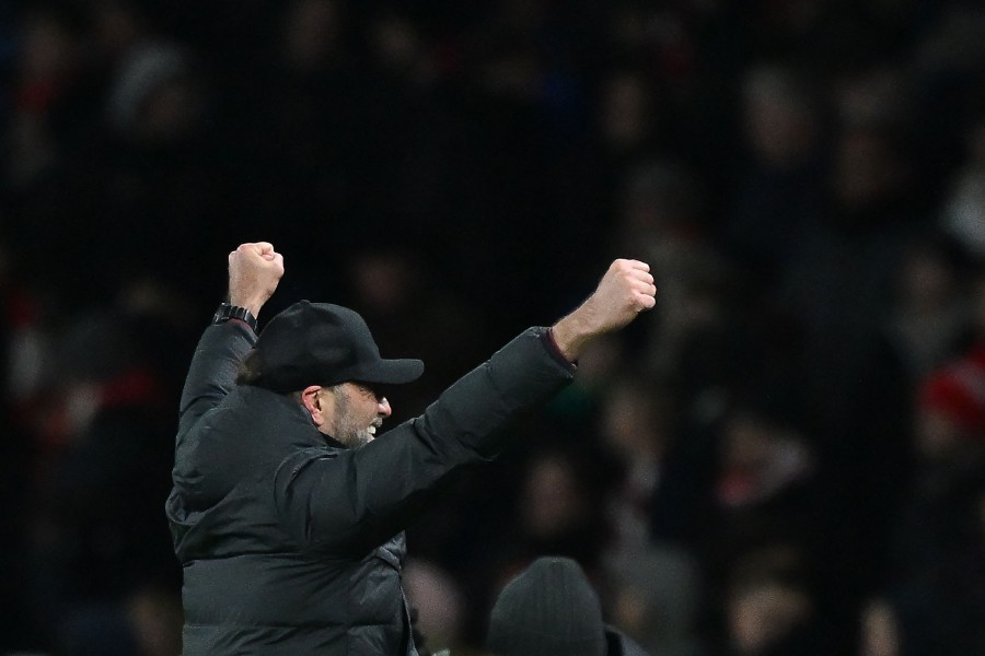 Liverpool's German manager Jurgen Klopp celebrates after they score their second goal during the English FA Cup third round football match between Arsenal and Liverpool at the Emirates Stadium in London. - AFP PIC