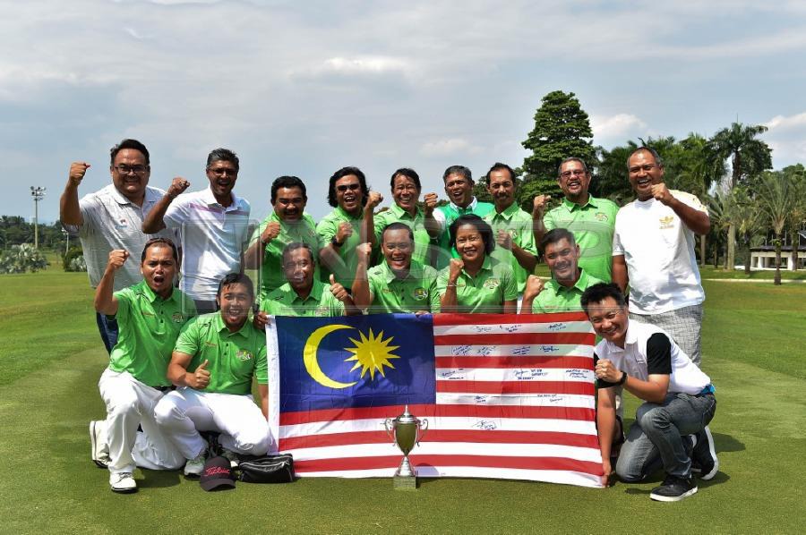 The Malaysian team celebrating after winning the Causeway Cup at Glenmarie Golf and Country Club, Shah Alam.
