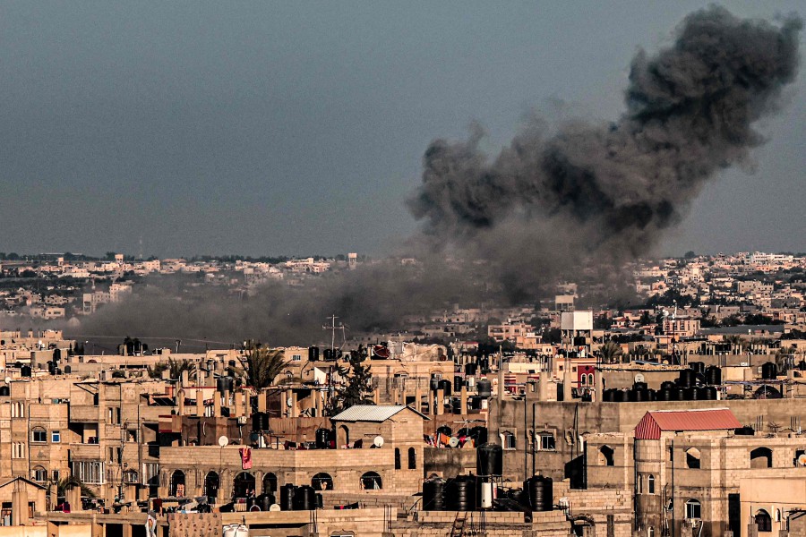 A smoke plume erupts during Israeli bombardment over Rafah in the southern Gaza Strip. - AFP PIC