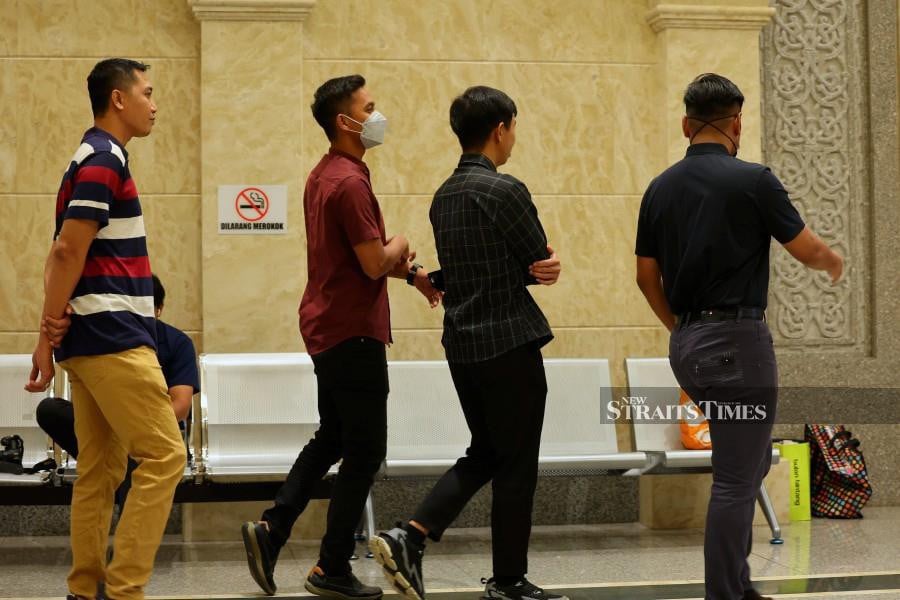 Some of trhe accused seen arriving at the Court of Appeal ahead of the trial. - BERNAMA PIC