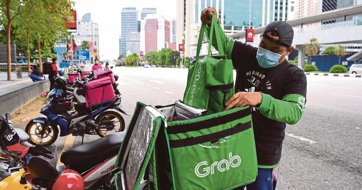 Grab to cut 5pct of employees after Covid-19 hit | New Straits Times