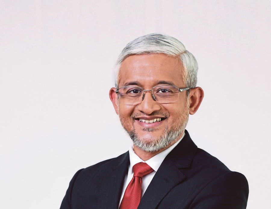 InvestKL chief executive officer Datuk Muhammad Azmi Zulkifli.