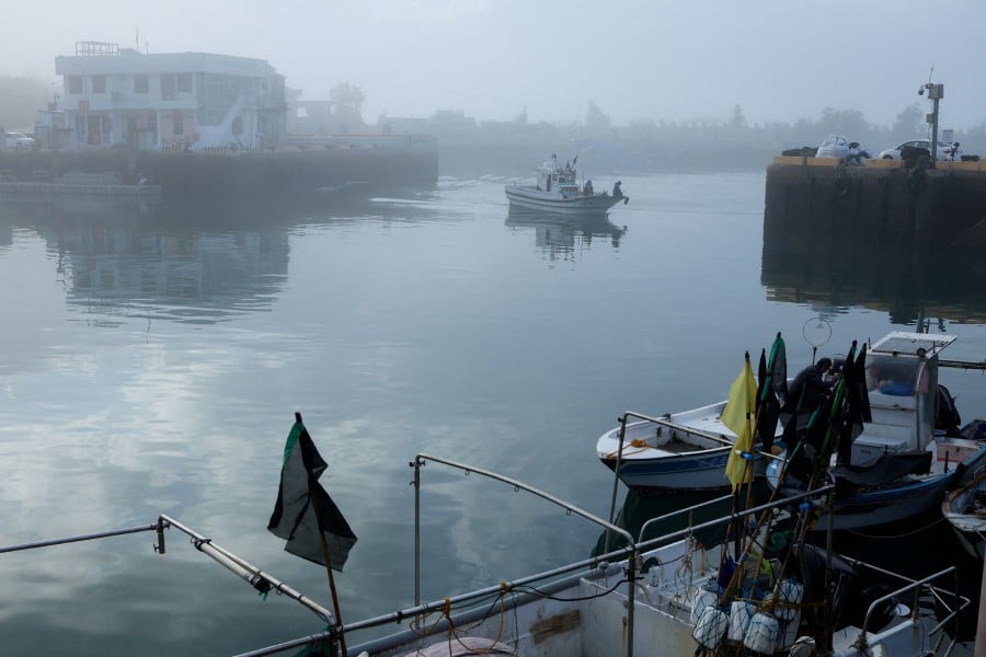 A fishing boat arrives at a port in Kinmen, Taiwan. (REUTERS/Ann Wang)