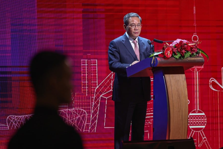  Chinese Premier Li Qiang delivering his speech during the 50th anniversary of Malaysia-China diplomatic relations dinner in Kuala Lumpur. - BERNAMA PIC