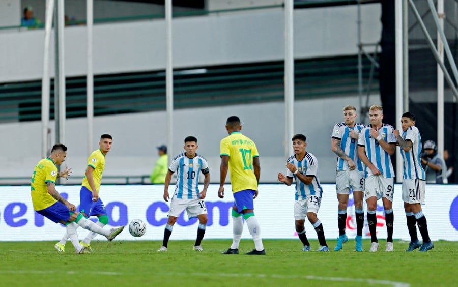 Brazil's Khellven shoots at goal from a free kick during the match against Argentina at Estadio Brigido Iriarte, Caracas, Venezuela.- REUTERS PIC