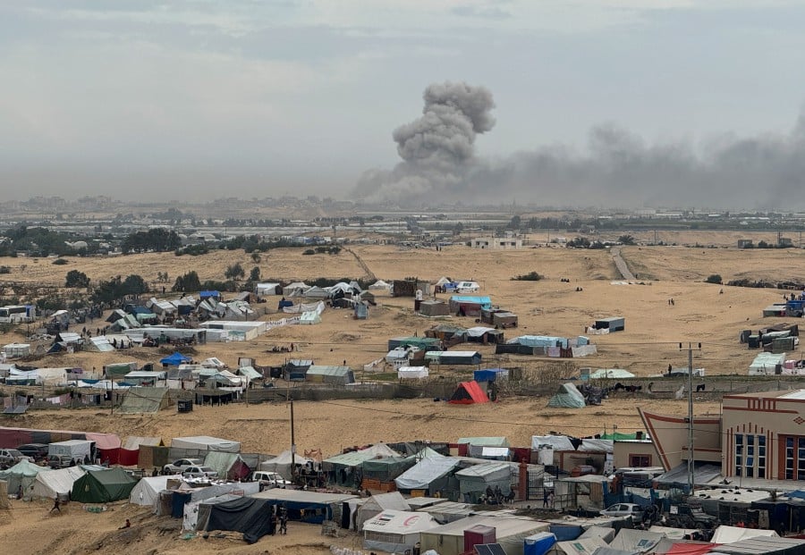 Smoke rises during an Israeli ground operation in Khan Younis, amid the ongoing conflict between Israel and Hamas, as seen from a tent camp sheltering displaced Palestinians in Rafah, in the southern Gaza Strip. - REUTERS PIC