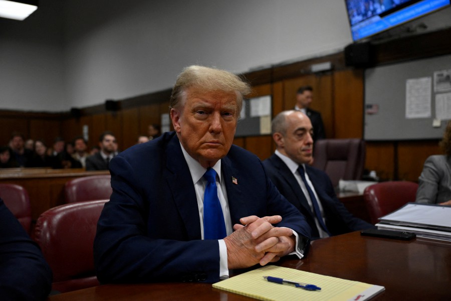 Former U.S. president and Republican presidential candidate Donald Trump looks on at Manhattan Criminal Court during his trial for allegedly covering up hush money payments linked to extramarital affairs in New York, U.S. - REUTERS PIC