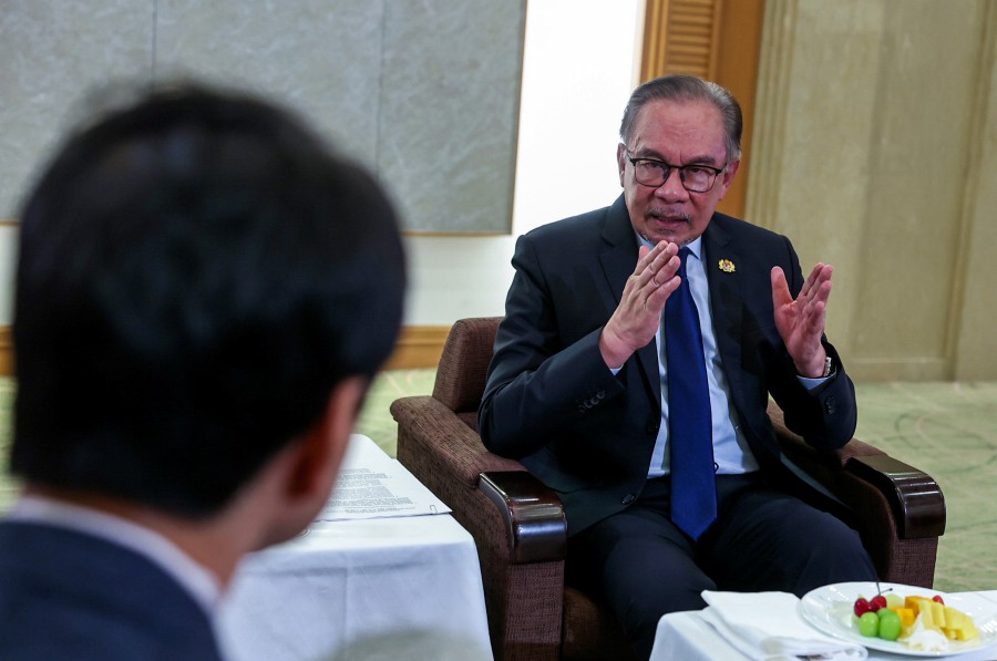  Prime Minister Datuk Seri Anwar Ibrahim speaks during a press conference with Nikkei Press in Tokyo on Thursday. - BERNAMA PIC