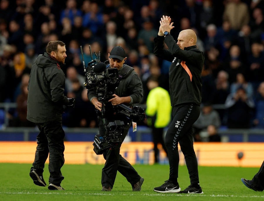 Everton manager Sean Dyche applauds fans after the match. - REUTERS PIC