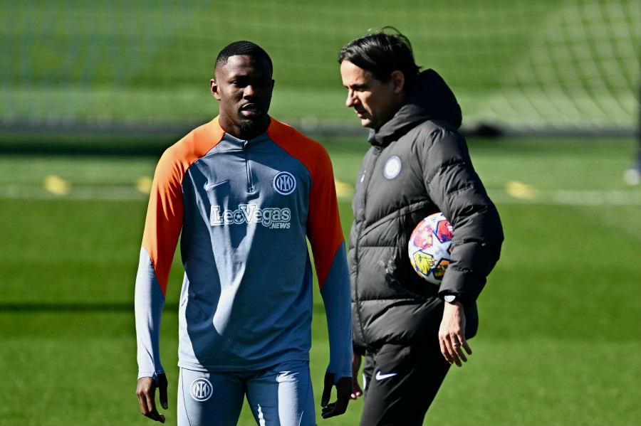 Inter Milan's Marcus Thuram and coach Simone Inzaghi attend a training session in Appiano Gentile near Milan. - AFP PIC