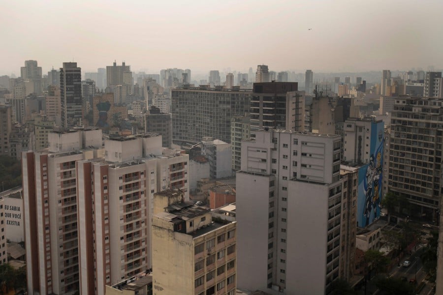 View of the city of Sao Paulo shrouded in smoke from Amazon forest fires, in Brazil. - AFP PIC