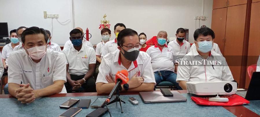 DAP’s secretary-general Lim Guan Eng (centre) said they were adamant in rejecting the party’s former Pengkalan Batu state assemblyman as a candidate to represent the opposition coalition in the polls. - NSTP/AMIR MAMAT. 