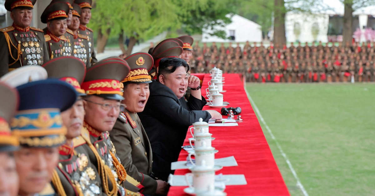 N. Korea's Kim Oversees Test Of Multiple Rocket Launcher | New Straits ...