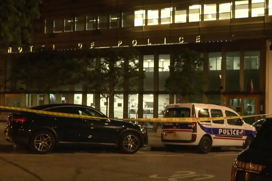 A cordoned off area outside a police station in the 13th district of Paris.-AFP PIC