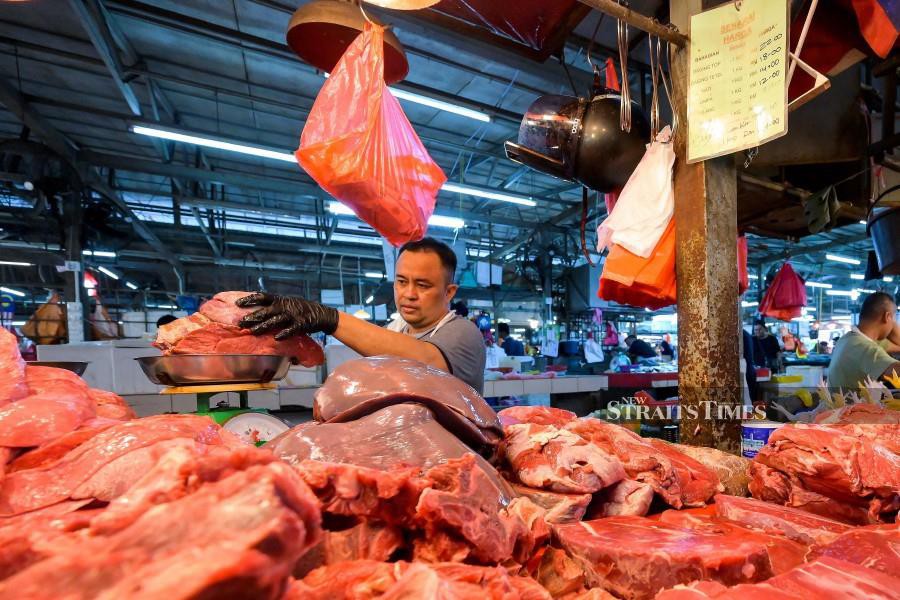 Consumers at the Chow Kit Market say the prices of meat, spices, and seafood among others have increased. NSTP/Raihana Mansor 