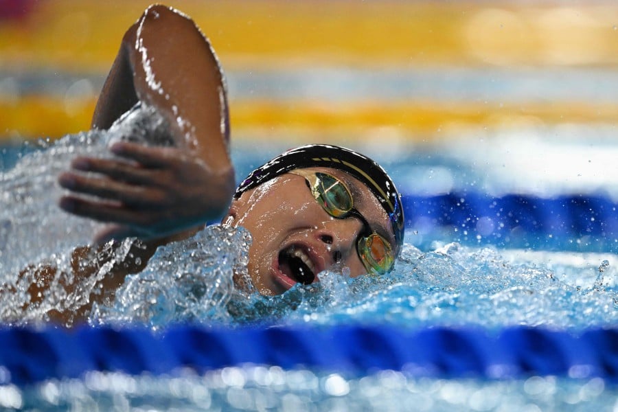 Malaysia's Khiew Hoe Yean competes in a heat of the men's 800m freestyle swimming event during the 2024 World Aquatics Championships at Aspire Dome in Doha. - AFP PIC