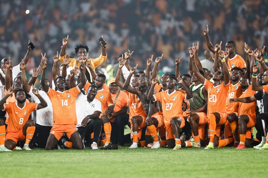 Ivory Coast's players celebrate after the victory at the end of the Africa Cup of Nations (CAN) 2024 round of 16 football match between Senegal and Ivory Coast at the Stade Charles Konan Banny in Yamoussoukro. - AFP PIC