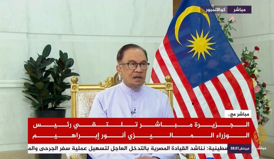Prime Minister Datuk Seri Anwar Ibrahim speaking during a special interview session with Al Jazeera. -BERNAMA PIC