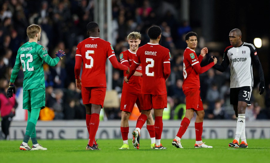 Liverpool's Caoimhin Kelleher, Ibrahima Konate, Bobby Clark, and Joe Gomez celebrate after the League Cup semi-final second leg match against Fulham at the Craven Cottage, London. - REUTERS PIC